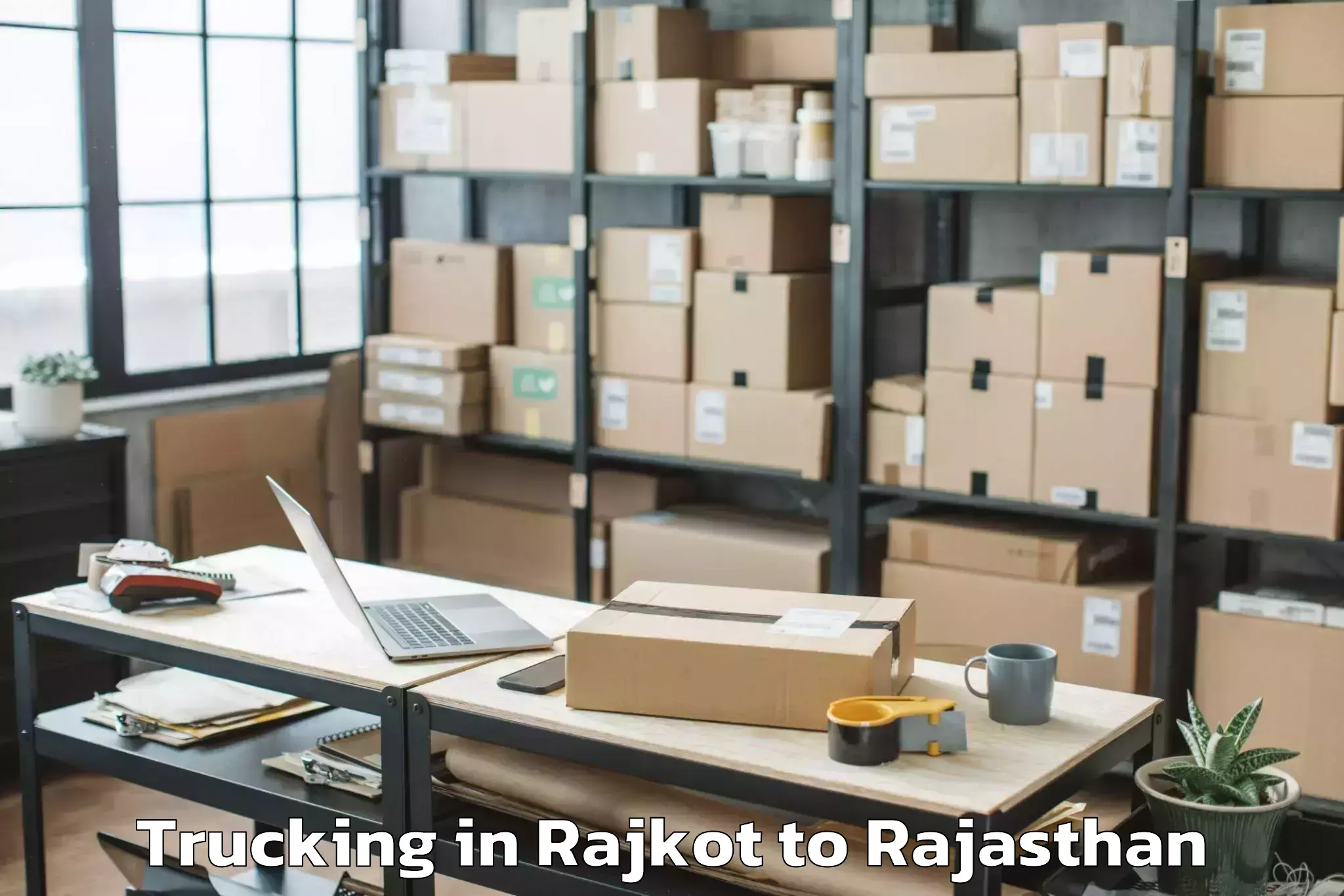 Leading Rajkot to Raisinghnagar Trucking Provider